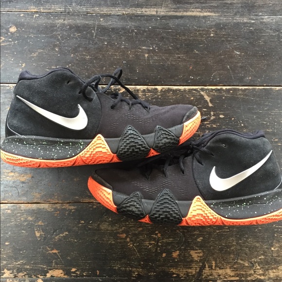 kyrie 4s black and orange